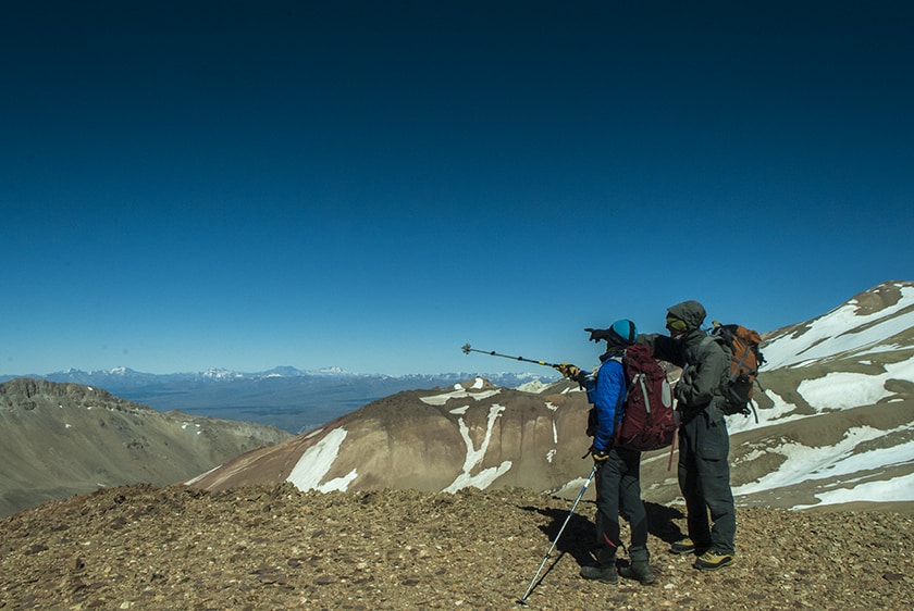 The guide and his assistant checking the route