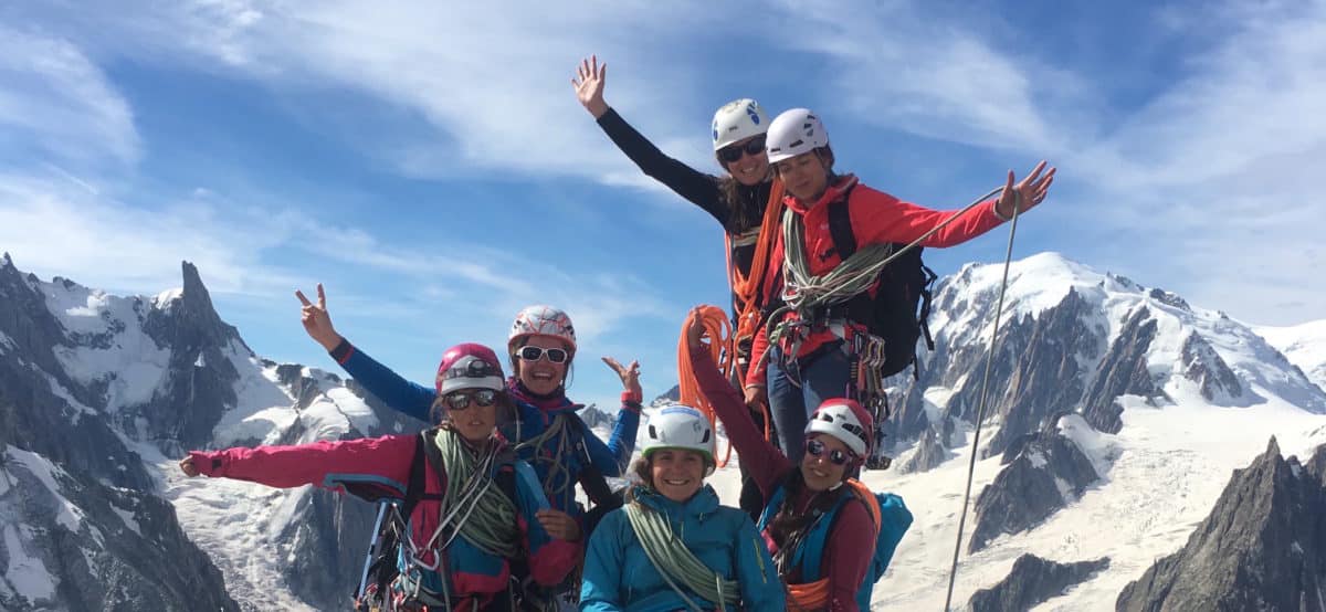 Women in the summit of a mountain